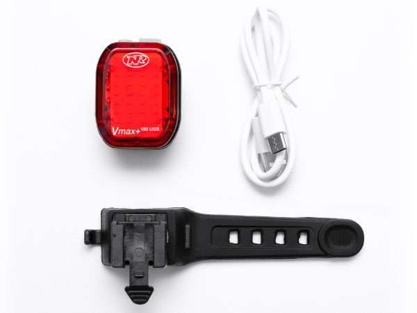 Box Contents showing light, rubber strap seat post mount, and white USB-C charging cable