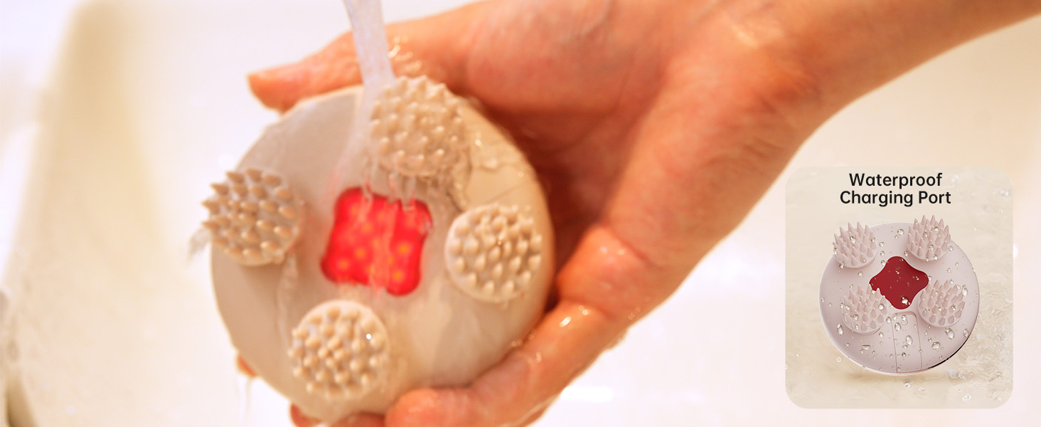 a hand holding a soap stone with a red and white label on it.