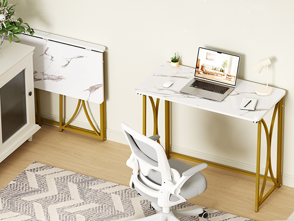 Unfolded foldable desk by bed, thin folding desk stores in the gap of white dresser with wall