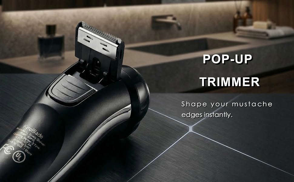 Cordless shaver with built in pop up trimmer for mustache