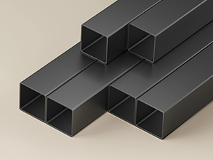 Multiple black rectangular hollow metal tubes or structural steel sections arranged parallel to each other against light background.
