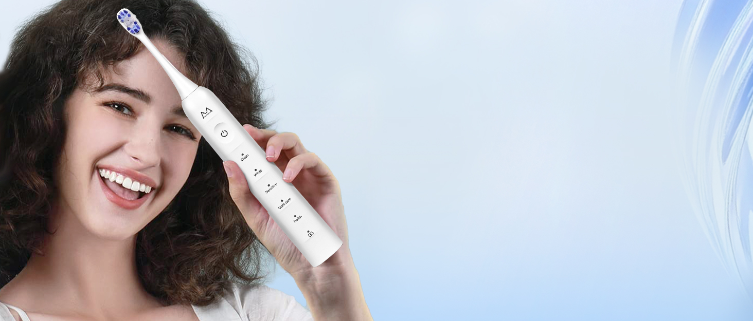 A pretty girl holds a Marlincare electric toothbrush