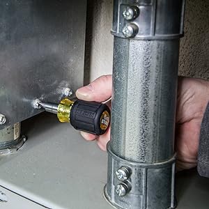 Multi-bit screwdriver has Phillips, Slotted bits, Nut Drivers