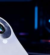 Abstract artistic composition featuring curved shapes in dark setting with blue accent lighting, creating dramatic contrast.