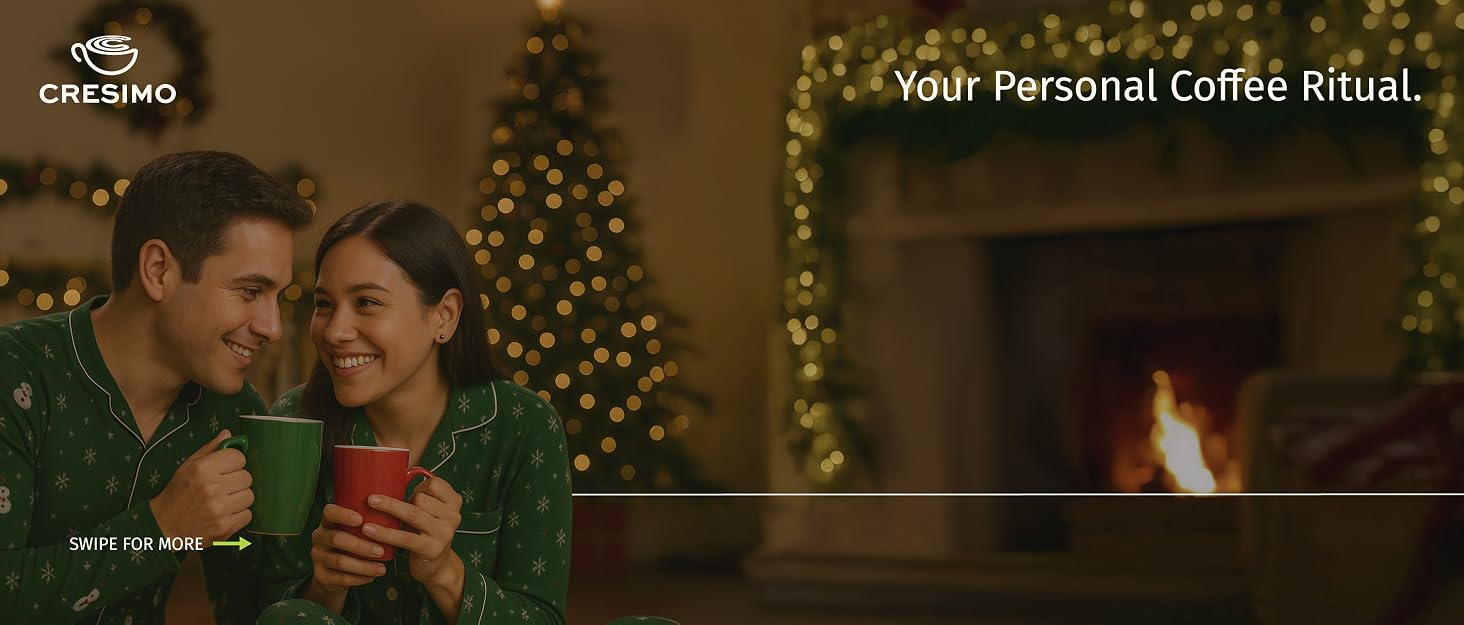A couple drinking a cup of coffee during cozied up on the couch for the holidays