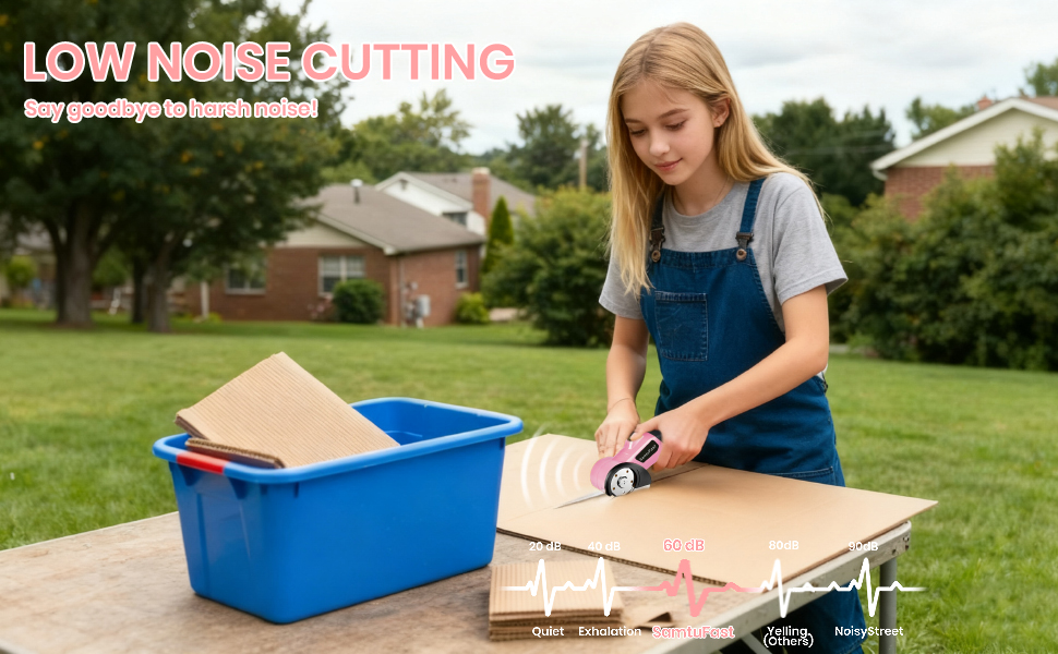 A girl cuts cardboard on the lawn with low-noise cardboard scissors, no ear protection needed.