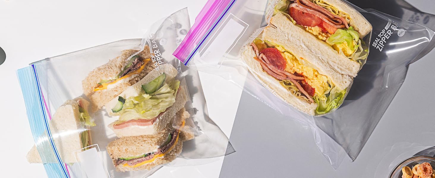 Sandwich Bags on table for display with food in them to show food grade safety and capacity storage 