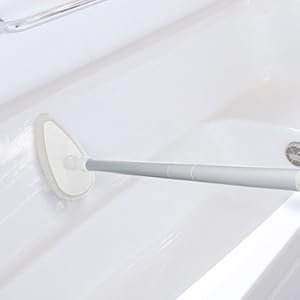 from the brand shower scrubber with long handle for cleaning.jpg