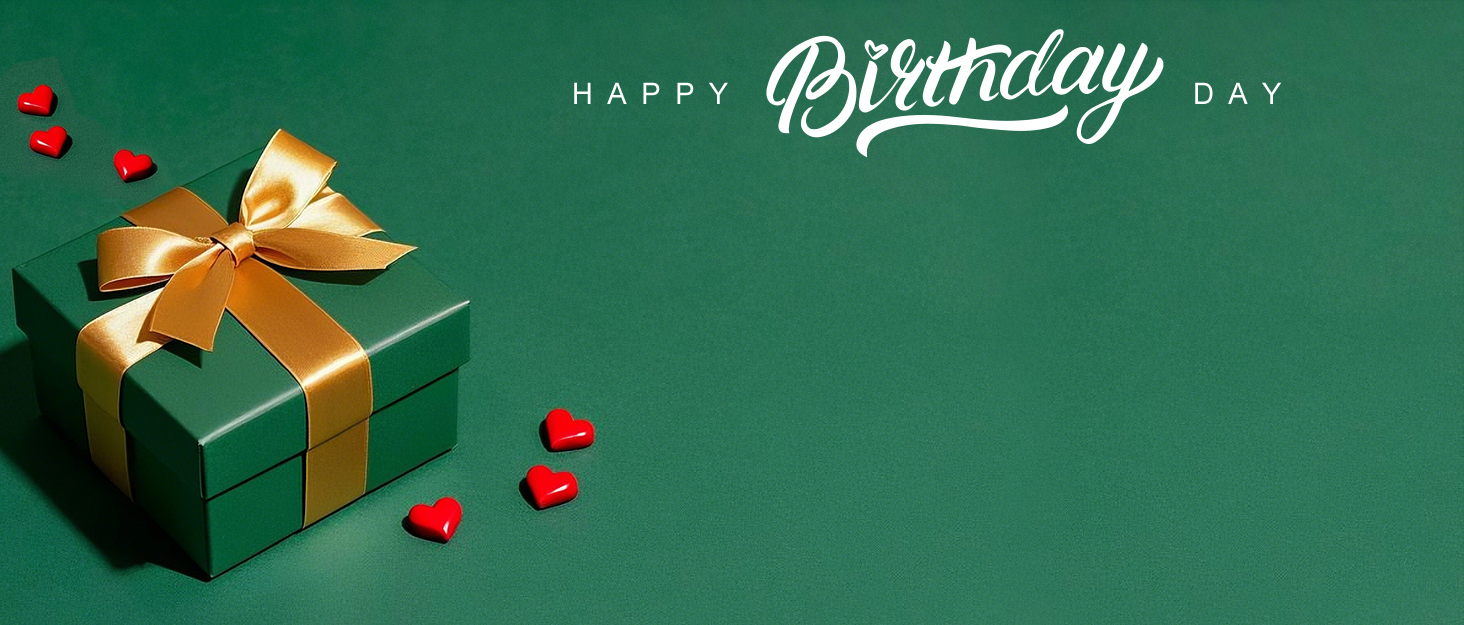 Green wrapped gift box with gold ribbon bow and small red heart decorations against emerald green background. 'Happy Birthday' text visible above.