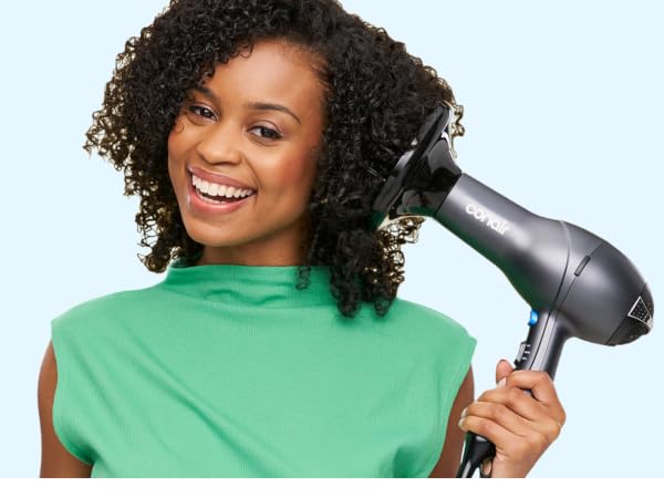Woman using diffuser attachment