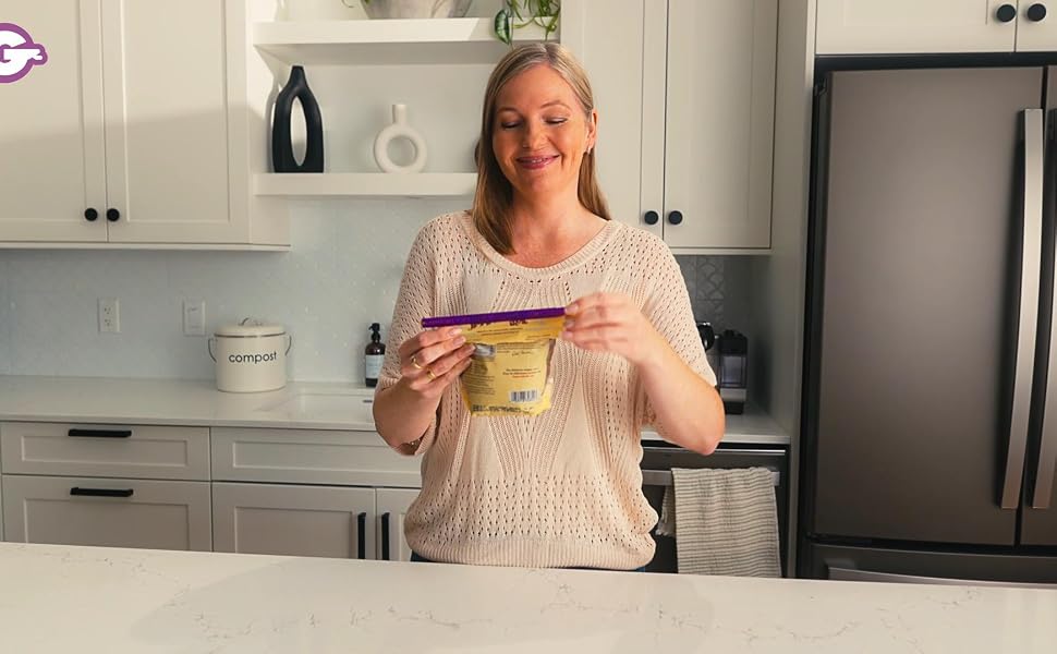 Woman holding a pantry item sealed with GripStic