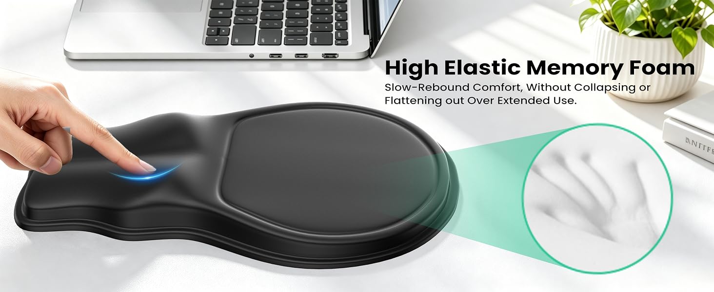 Hand pressing the memory foam wrist rest showing slow rebound and even support.