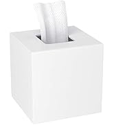 White cubic tissue box holder with textured tissue paper protruding from square opening on top. Minimalist modern design in matte white finish.