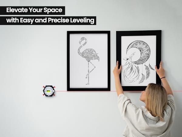Zanis Laser Level helping user hang picture frames with easy and precise leveling.