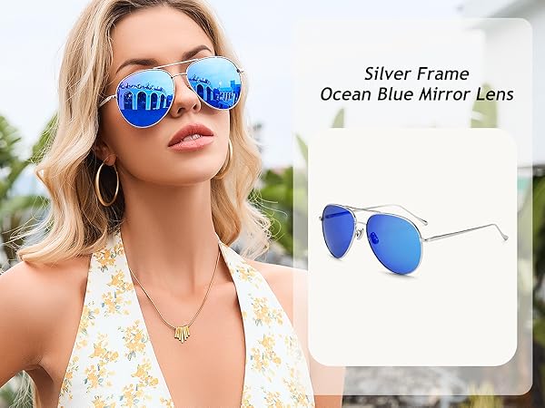 A beautiful women wearing blue mirror aviator sunglasses