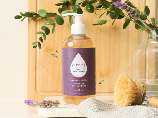 Puracy Gel Hand Soap bottle next to eucalyptus, highlighting a better way to clean.