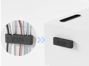 Two views of a gray wall-mounted organizer. Left shows it holding various pens and tools. Right shows empty organizer attached to wall.