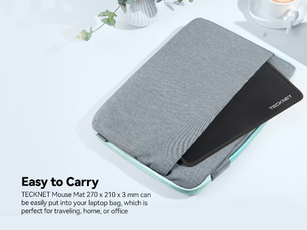 Foldable gray mouse pad with black underside. Text states it's 270 x 210 x 3 mm, easily portable for travel, home, or office use.