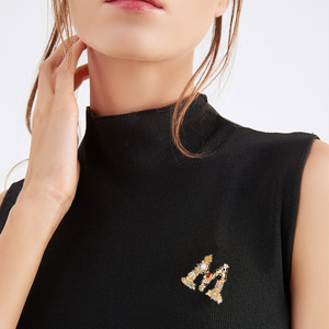 letter brooch