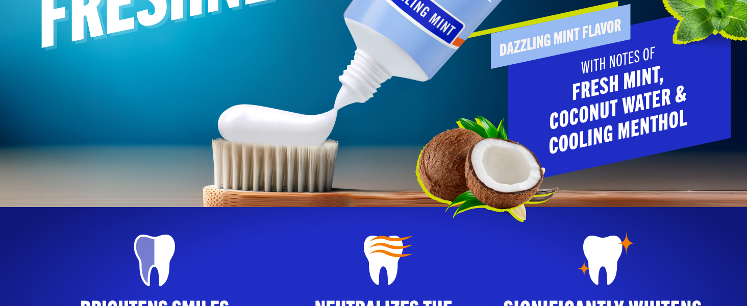 Fluoride toothpaste gel being squeezed onto a toothbrush with mint and coconut denoting freshness