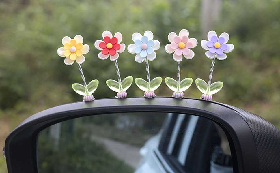 Flower ornaments decorate rearview mirror