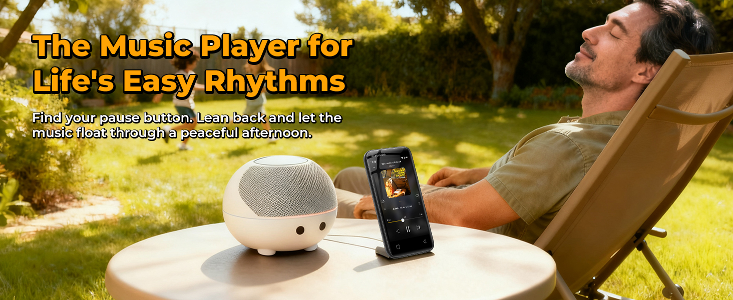 MP3 player on a table with a speaker, while a person relaxes in the yard on a sunny day