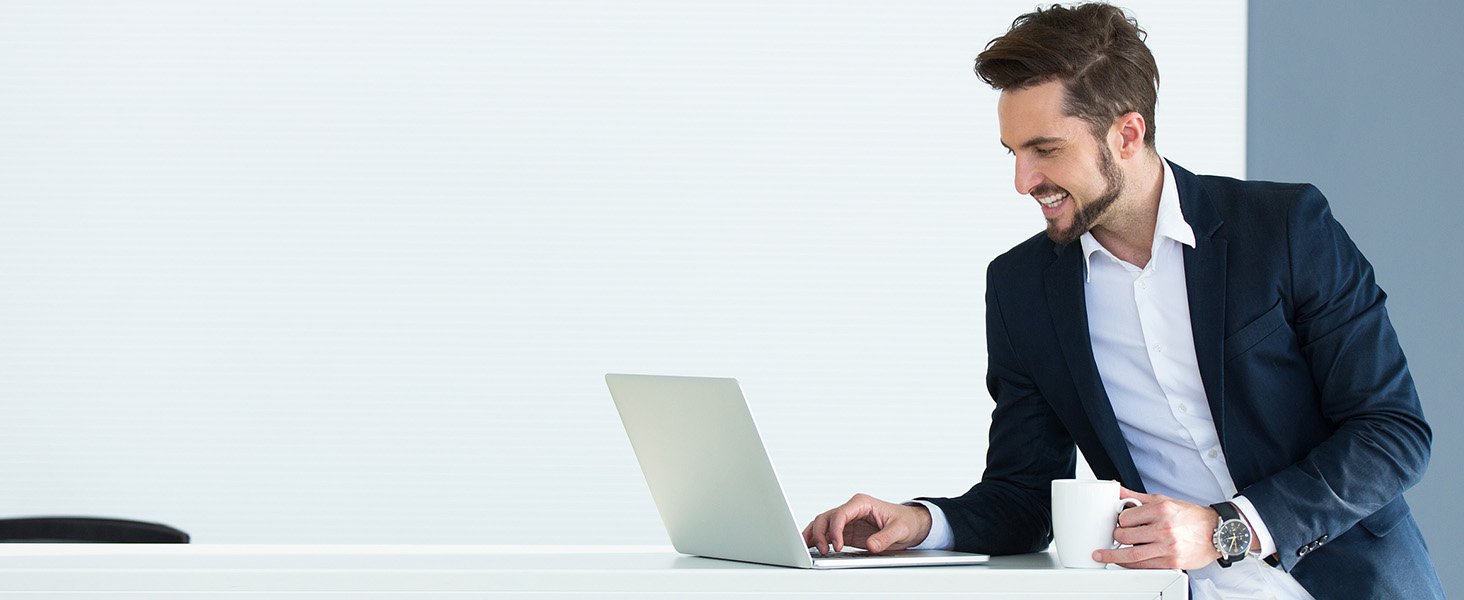 Multiple images showing someone in business attire working at a desk, reviewing documents and using a laptop computer.