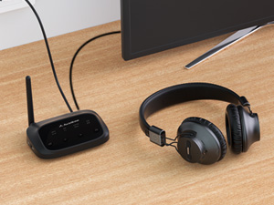 Power on the transmitter and the headphones. They will automatically connect.