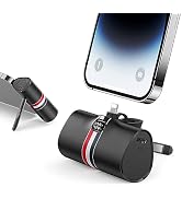 Compact black cylindrical device with red and white stripe. Features retractable Lightning connector and 100W label. Shown connected to smartphone, likely a portable charger or power bank.