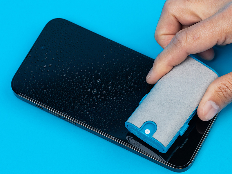 Wiping spray off iphone