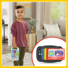 Kid stands, holding Slide-to-Read ABC Flash Card reader. Inset shows multiple cards stored in back.
