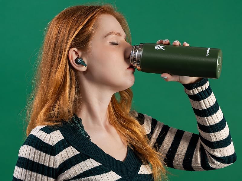 Drinking out of waterbottle wearing go pods