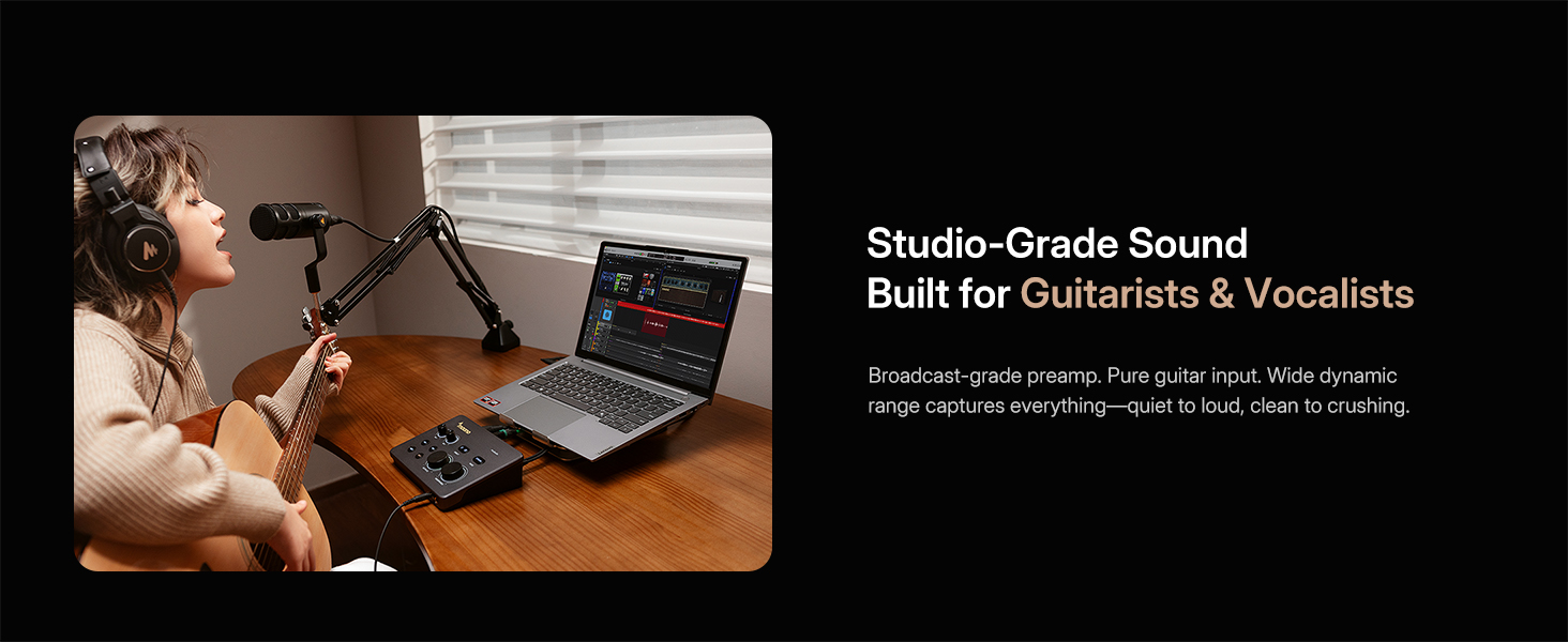 Guitarist vocalist recording guitar vocal tracks with Maono P2 audio interface