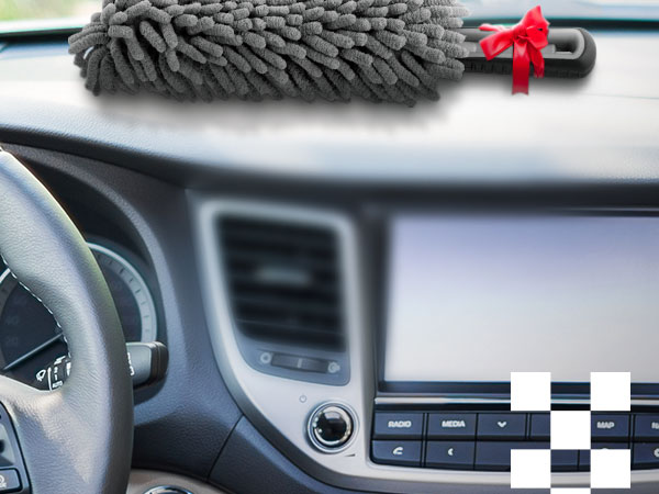 Compact gray dash duster placed on car dashboard, perfect for daily interior cleaning