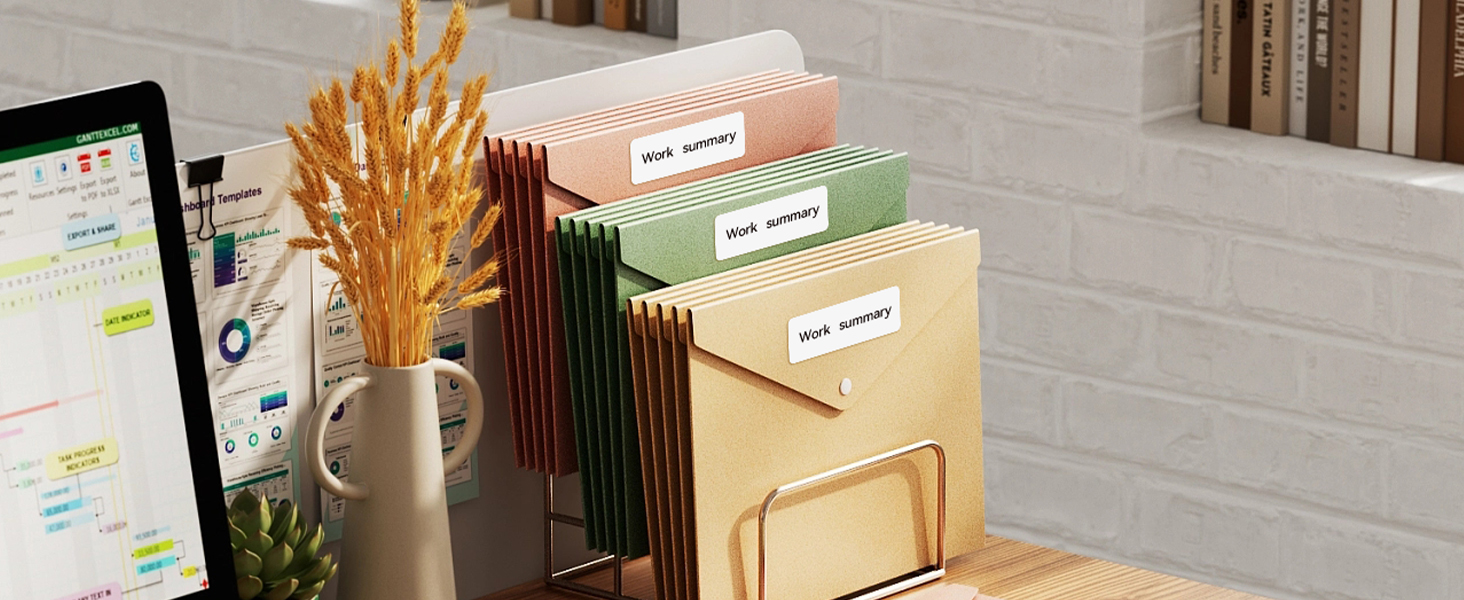 a stack of paper folders on a desk.