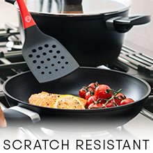 Cooking spatula turning salmon