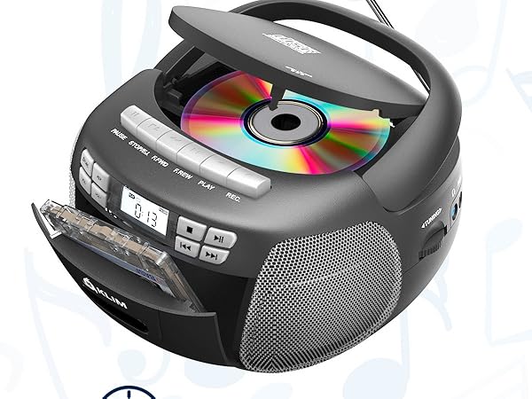 Portable CD player with digital display, speakers, and control buttons shown from multiple angles. Gray/black color scheme with rounded design.