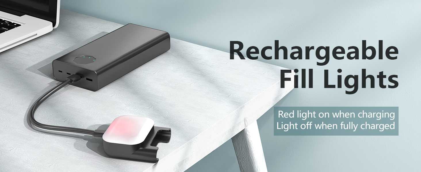Rechargeable fill light with a pink illuminated surface, connected to a power bank. Text indicates red light when charging, off when fully charged.