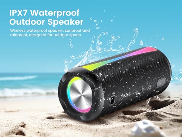 Text reads 'IPX7 Waterproof' and 'Outdoor Speaker'. Black waterproof speaker with RGB lighting shown in beach setting with water splashes.