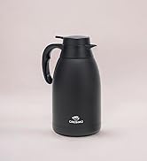 Cresimo black stainless steel coffee carafe with a black handle on a neutral background.