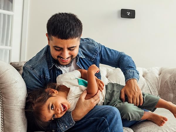 Familiy with Sensi Life on the Wall Mobile Version