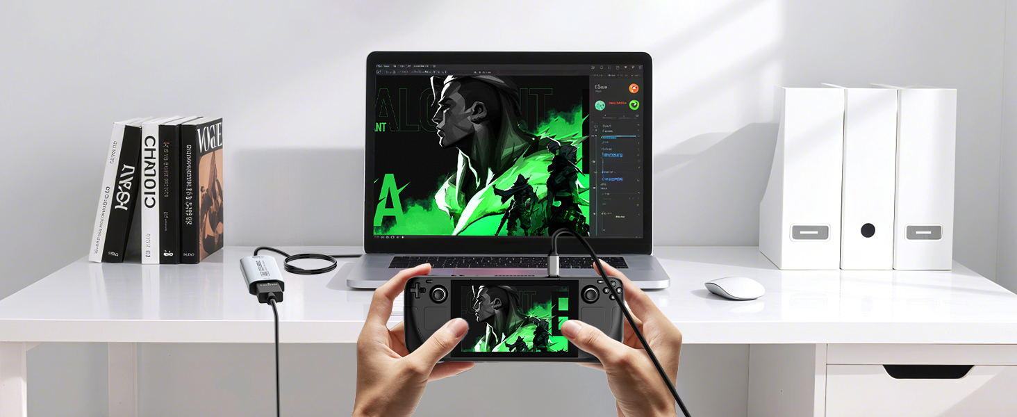 Desktop setup with monitor displaying green stock market chart, tablet device being held showing similar data, white storage units visible in background.