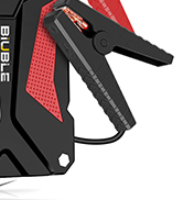 Black and red handheld heat gun or glue gun tool with ergonomic grip handle and adjustable settings visible on the side.