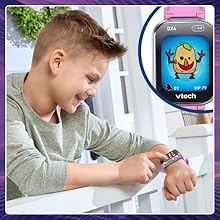 Kid presses screen buttons on DX4 to play exciting games like Monster Catcher and more.