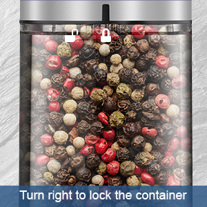 Close-up of electric grinder showing twist lock container for safe pepper and salt storage