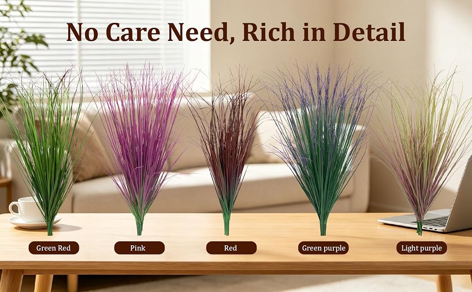 Five colored artificial reed grass bundles displayed on wooden coffee table in living room