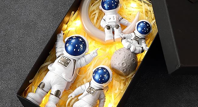 blue astronaut statues