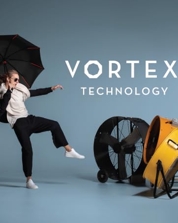wind blowing from large fans at a man with a Vortex umbrella