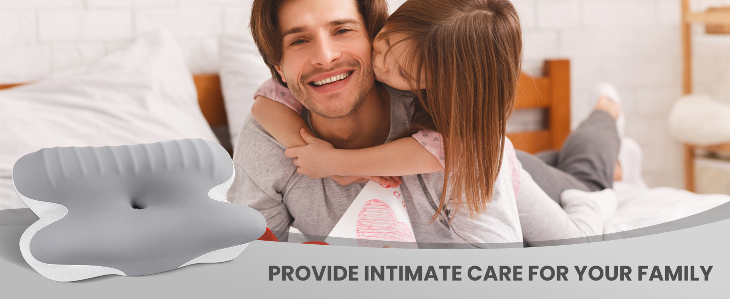 Gray foam-like object with curved edges and a central indentation, positioned below an image of people embracing. Text reads 'PROVIDE INTIMATE CARE FOR YOUR FAMILY'.