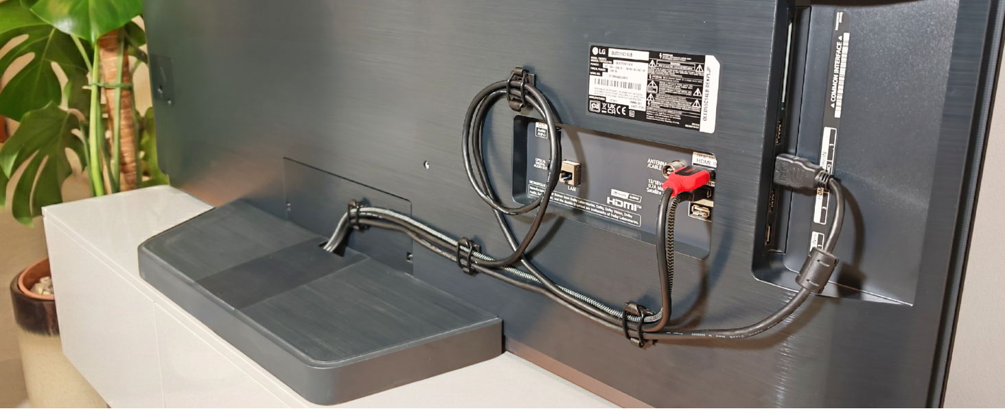 Cables secured behind TV.
